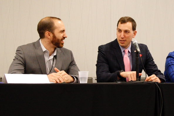 Dr. Nathan Moore of Barnes-Jewish Hospital in St. Louis, Missouri and Dr. Jesse Ehrenfeld of Vanderbilt University in Nashville, Tennessee chat before chairing a panel on medical-school education reform at the Association of Health Care Journalists’ national conference in Cleveland, Ohio on April 9, 2016. Photo/Sandra L. McGill