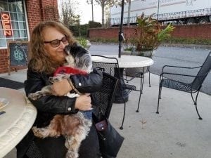 Rhonda Nally and her dog, Cooper.