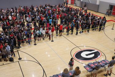 Students line up for free merchandise during last year’s Ramsey Palooza event at the University of Georgia Ramsey Student Center in Athens, Georgia on November 8, 2018. “The first event I attended was because I heard they had free T-shirts and other free stuff so I started going,” UGA sophomore Claire Ajuebor said. “If you throw in something free it’s cool because it’s something I can keep, it reminds me of the event and everything like that.” (Photo Courtesy/UGA Recreational Sports)
