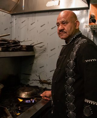 At Girasoles on Tuesday, August 27, 2019, Zambrano covered chicken on the stove to trap the heat and allow the meat to cook from the center. He said that he creates food based on the way people like to eat and the tastes and flavors that people enjoy. (Photo/Mary Martin Harper)