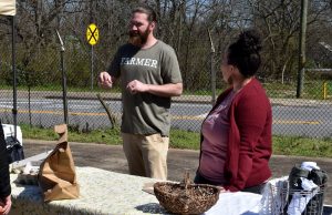 Farmers Chez and Neah Maxwell at the Jittery Joe’s Roaster for the winter market in February 2o2o (Photo/ Missy Tucker)