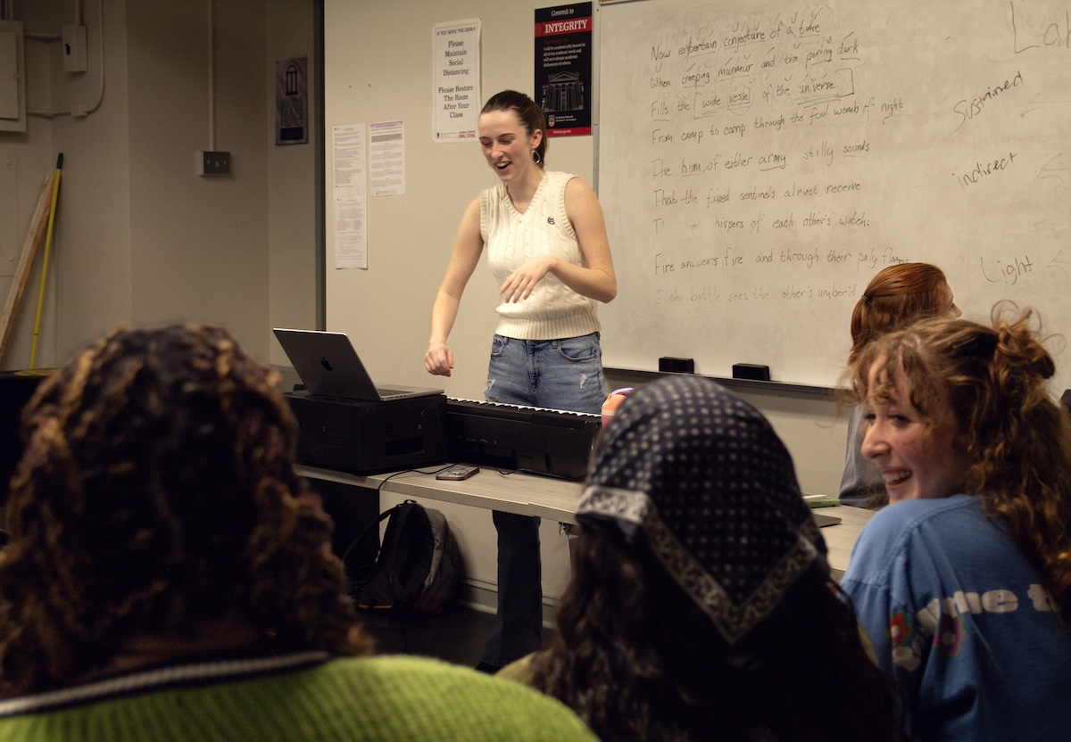 Wyn Alyse Thomas and cast members of “First Semester: A Musical,” gather in a rehearsal room at the University of Georgia’s Fine Arts Building to go over a new song for the show on Thursday, February 1, 2024. The rehearsals take place five days a week in preparation for the show. (Photo/ Katie Harrill)