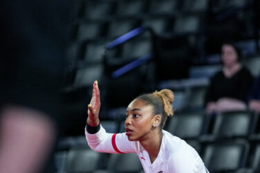 Bianna Muoneke of the UGA volleyball team prepares to serve during a match in November.