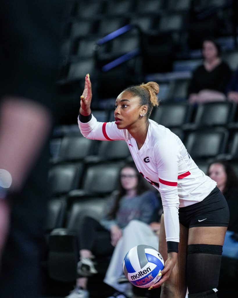 Bianna Muoneke of the UGA volleyball team prepares to serve during a match in November.