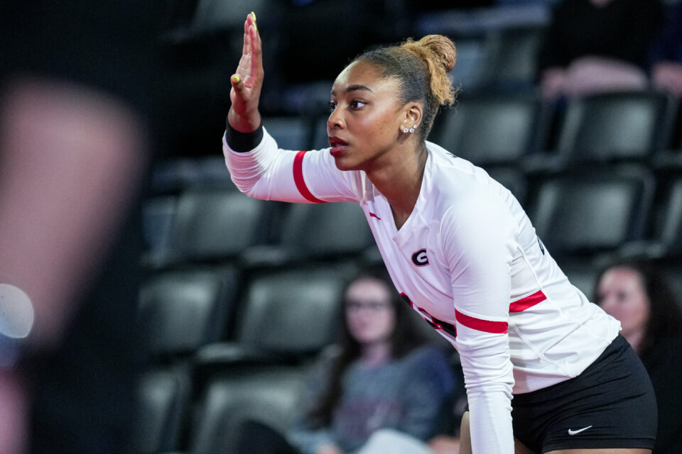 Bianna Muoneke of the UGA volleyball team prepares to serve during a match in November.