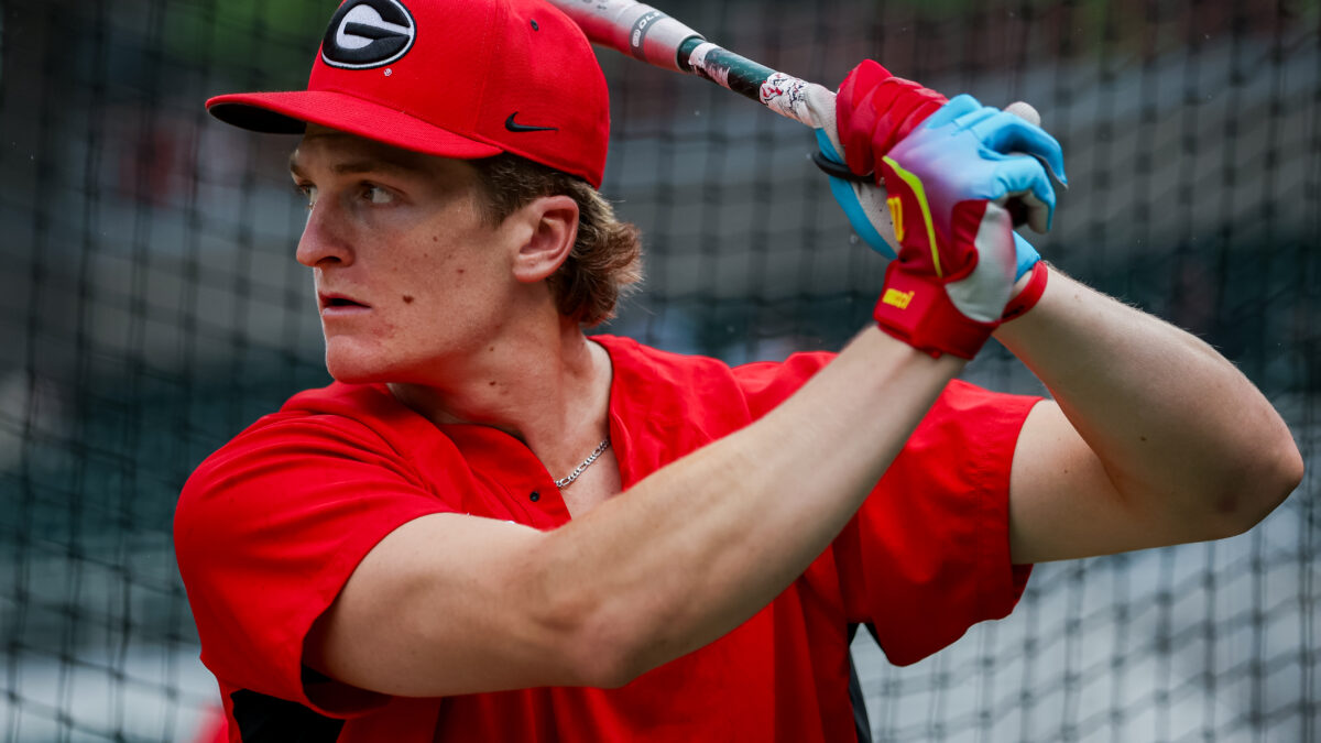 A baseball player taking batting practice