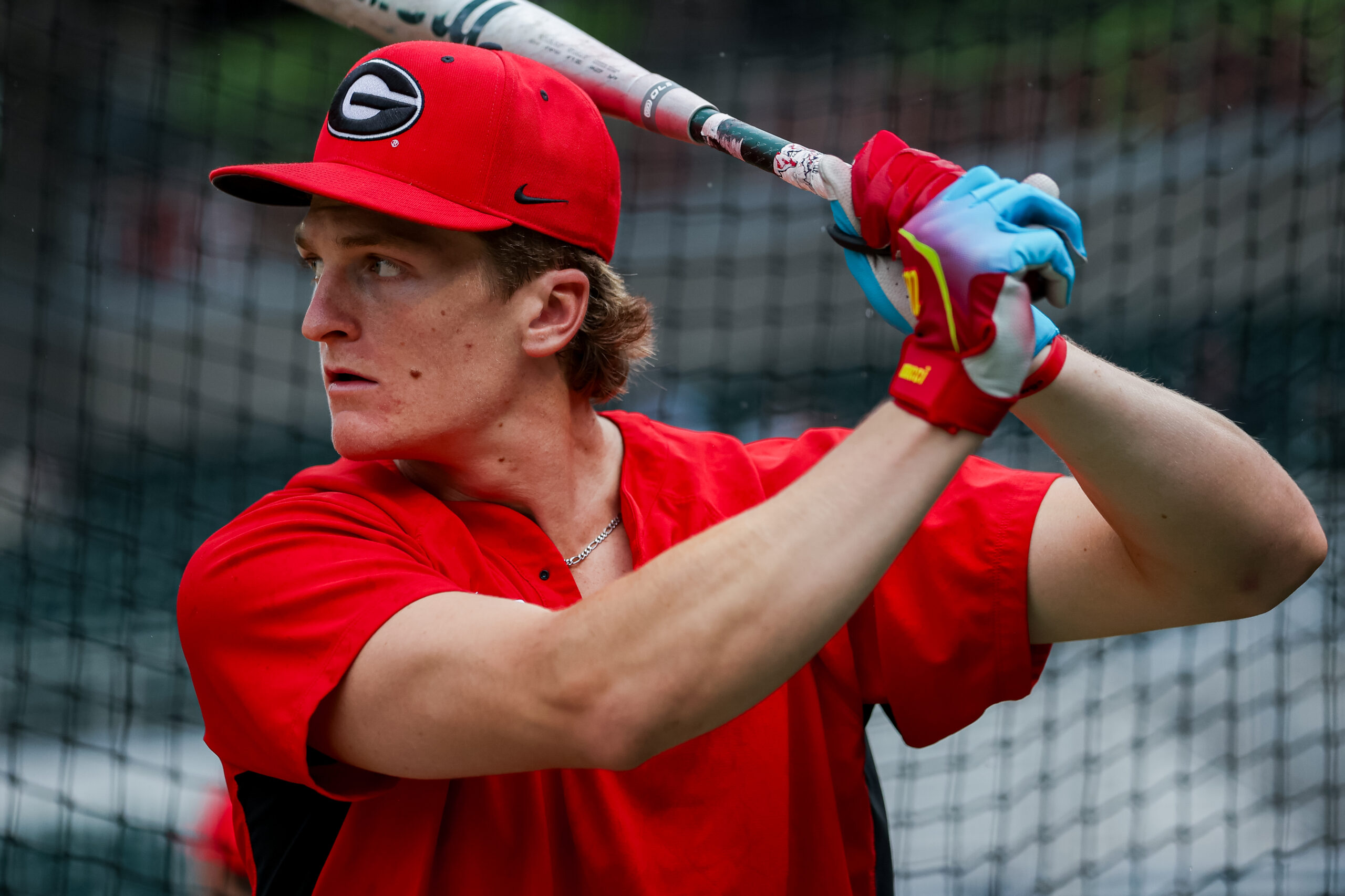 A baseball player taking batting practice