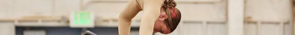 An equestrian vaulter performs during a competition.