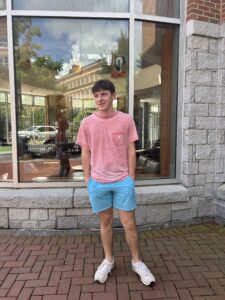 UGA student standing in front of the bookstore