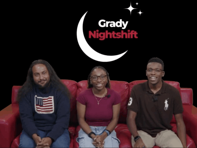 Three hosts sitting on a red couch with the Grady Nightshift logo behind them