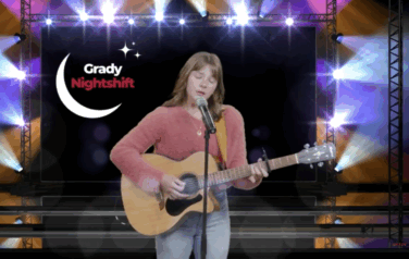 Woman playing a guitar