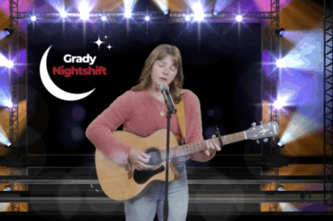 Woman playing a guitar