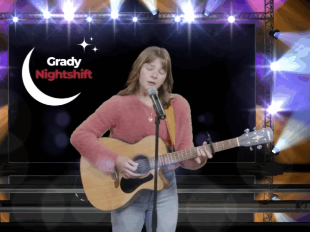 Woman playing a guitar