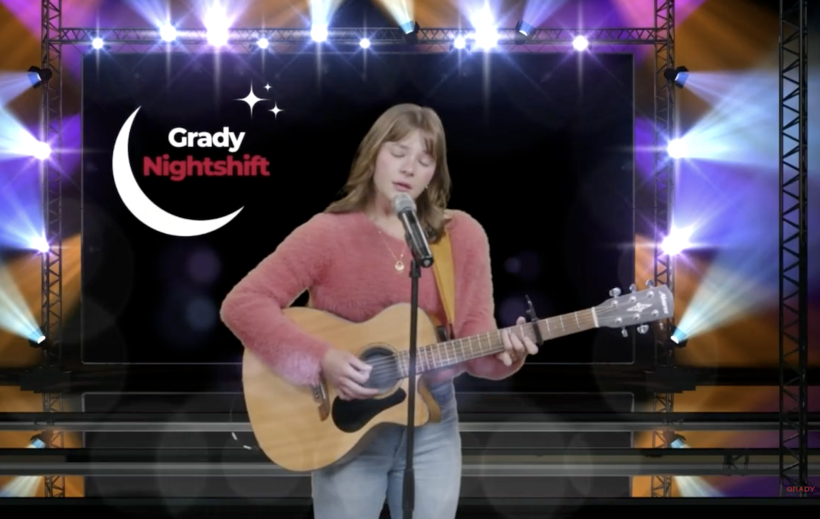 Woman playing a guitar