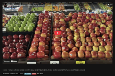 Screenshot of a Grady Newsource story on SNAP benefit cuts showing apples in a supermarket
