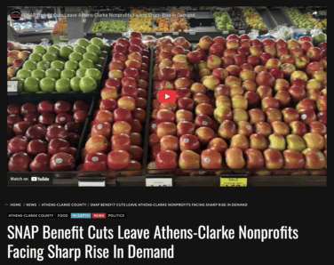 Screenshot of a Grady Newsource story on SNAP benefit cuts showing apples in a supermarket