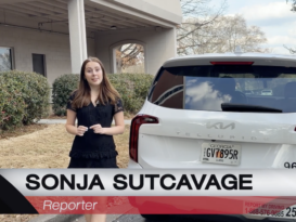 Sonja Sutcavage talks about flock cameras next to a white car