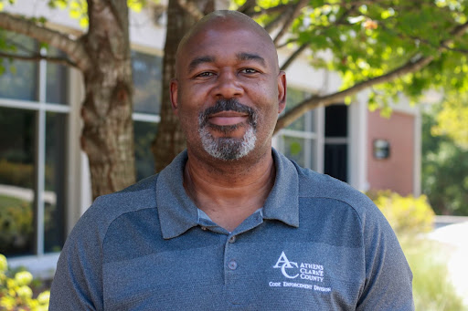 Headshot of Athens-Clarke County Code Enforcement Division Administrator Jack Reddick outside of University of Georgia's Grady College of Journalism & Mass Communication.