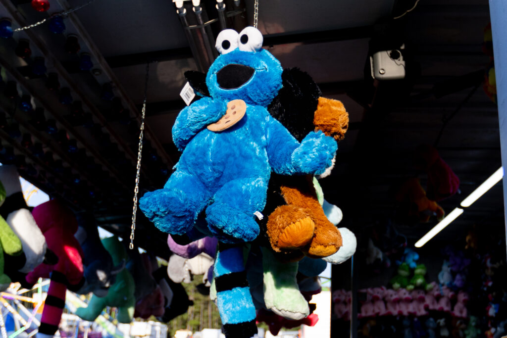 Cookie monster doll as a prize at a fair