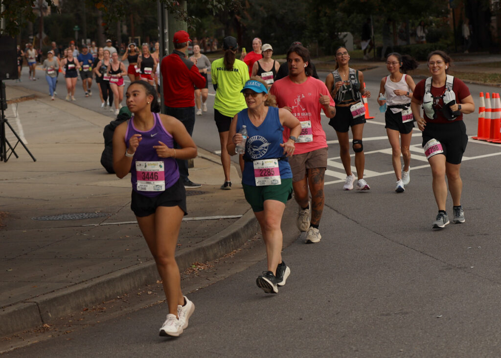 Runners compete in the 2025 AthHalf Half Marathon. The event spans 13.2 miles through downtown Athens, historic neighborhoods and the University of Georgia campus. 