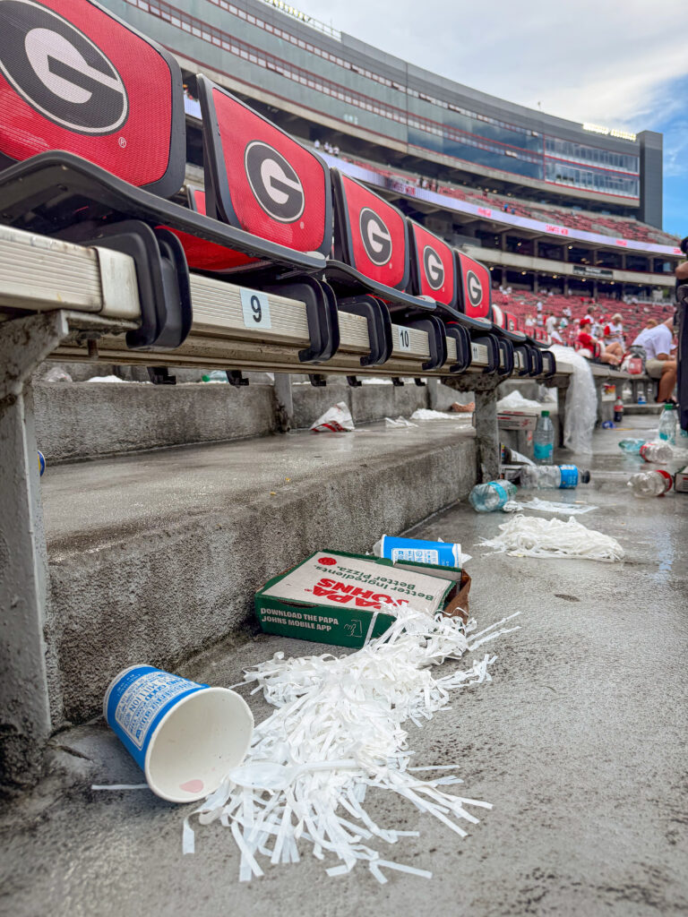 Sanford Stadium stands with food waste after the game